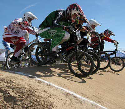 Matt Kelty's got the inside line in this Super Ex lap around Nellis BMX. - Photo by Kevin O'Brien/NBL 